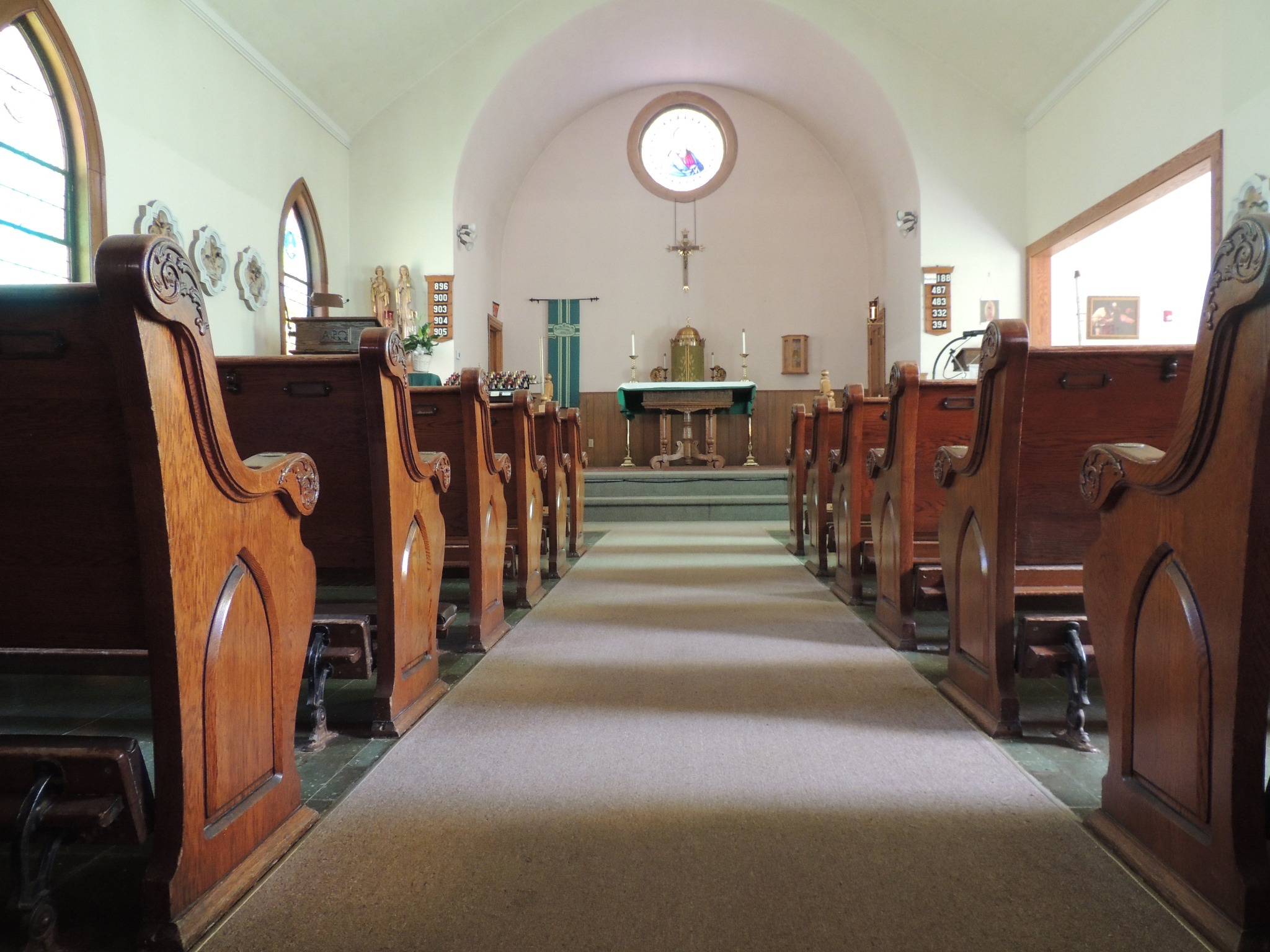 Interior walkway and pews of St. Thomas the Apostle church